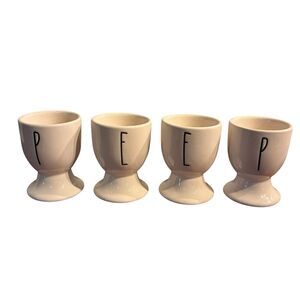 Rae Dunn Artisan Collection MagentaWhite 4 Piece Set Of Egg Cups. Spells P E E P